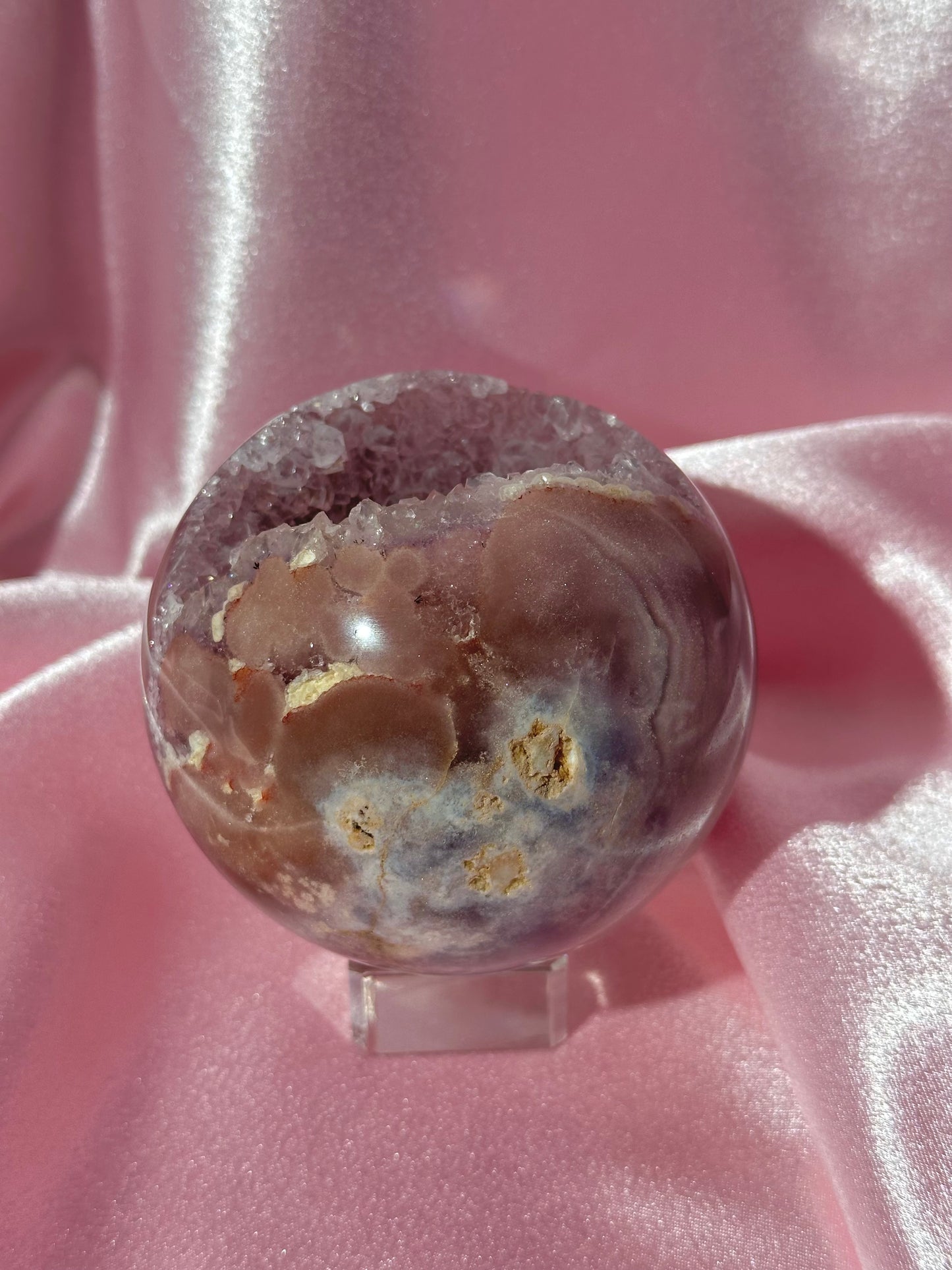 Lavender-toned glittery Brazilian pink amethyst sphere with stunning quartz cave
