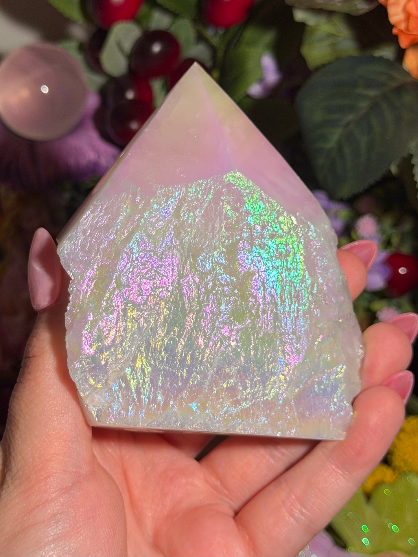 Aura coated rose quartz half polished point from Brazil
