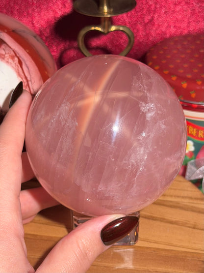High quality star rose quartz sphere with golden glittery flash