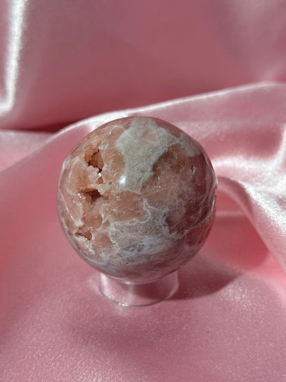 Brazilian pink amethyst sphere with unique bubbly druzy cave