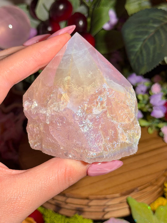 Aura coated rose quartz half polished point from Brazil