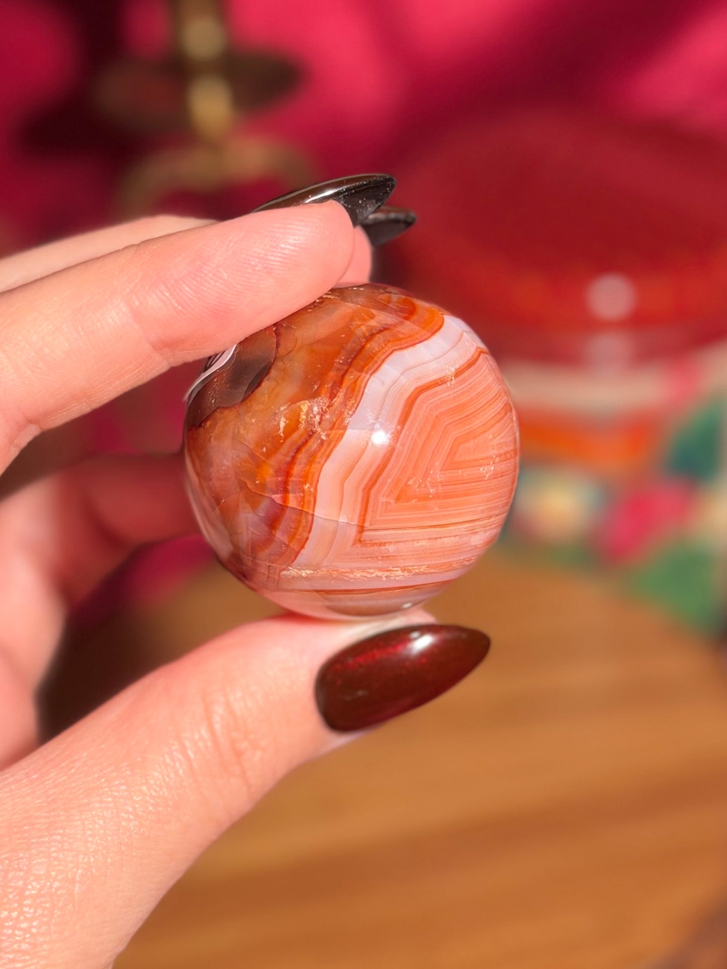 Peachy pink carnelian sphere