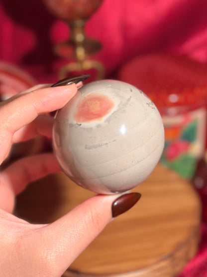 Cool grey polychrome jasper sphere with a pop of pink
