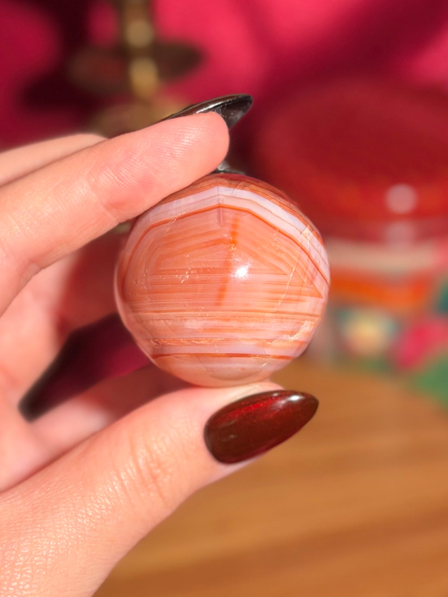 Peachy pink carnelian sphere