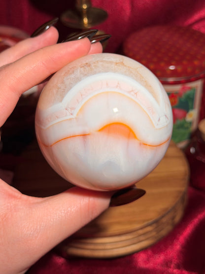 Pastel cool toned pink carnelian sphere with quartz 75mm