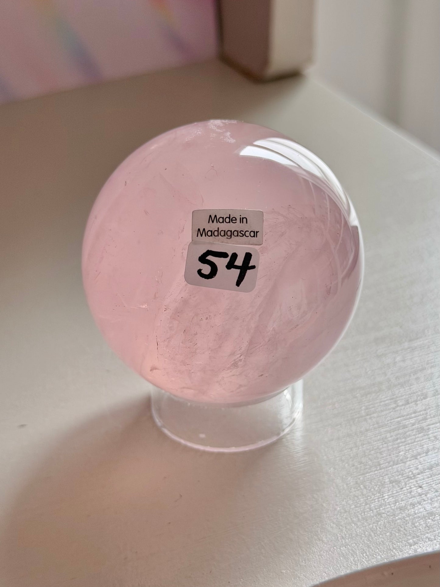 Pale pink gemmy star rose quartz sphere