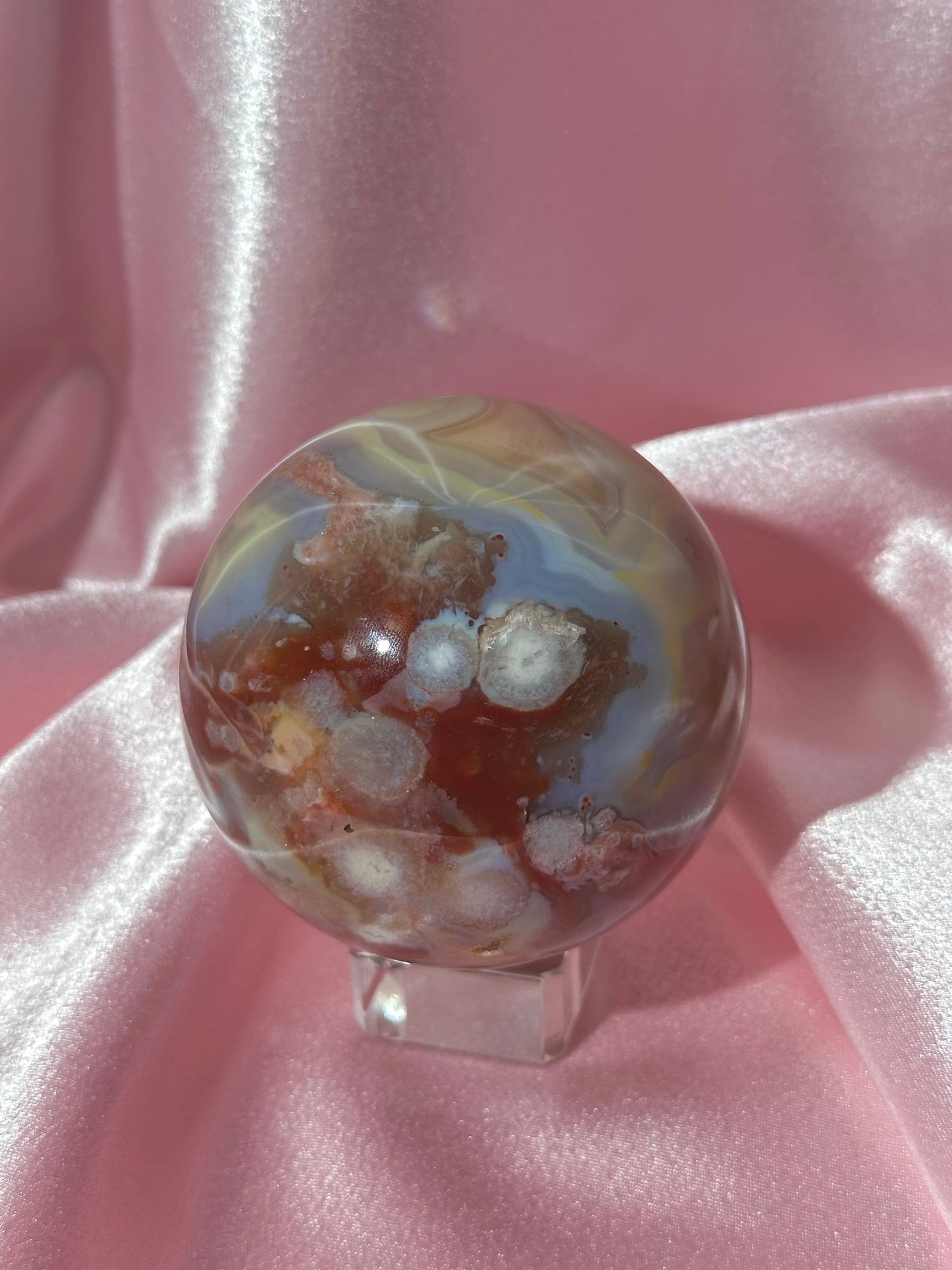 Perfect pastel peachy yellow & blue flower agate sphere from Madagascar