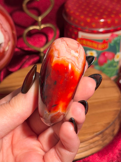 Red & pink carnelian palmstone with orca inclusions 17A