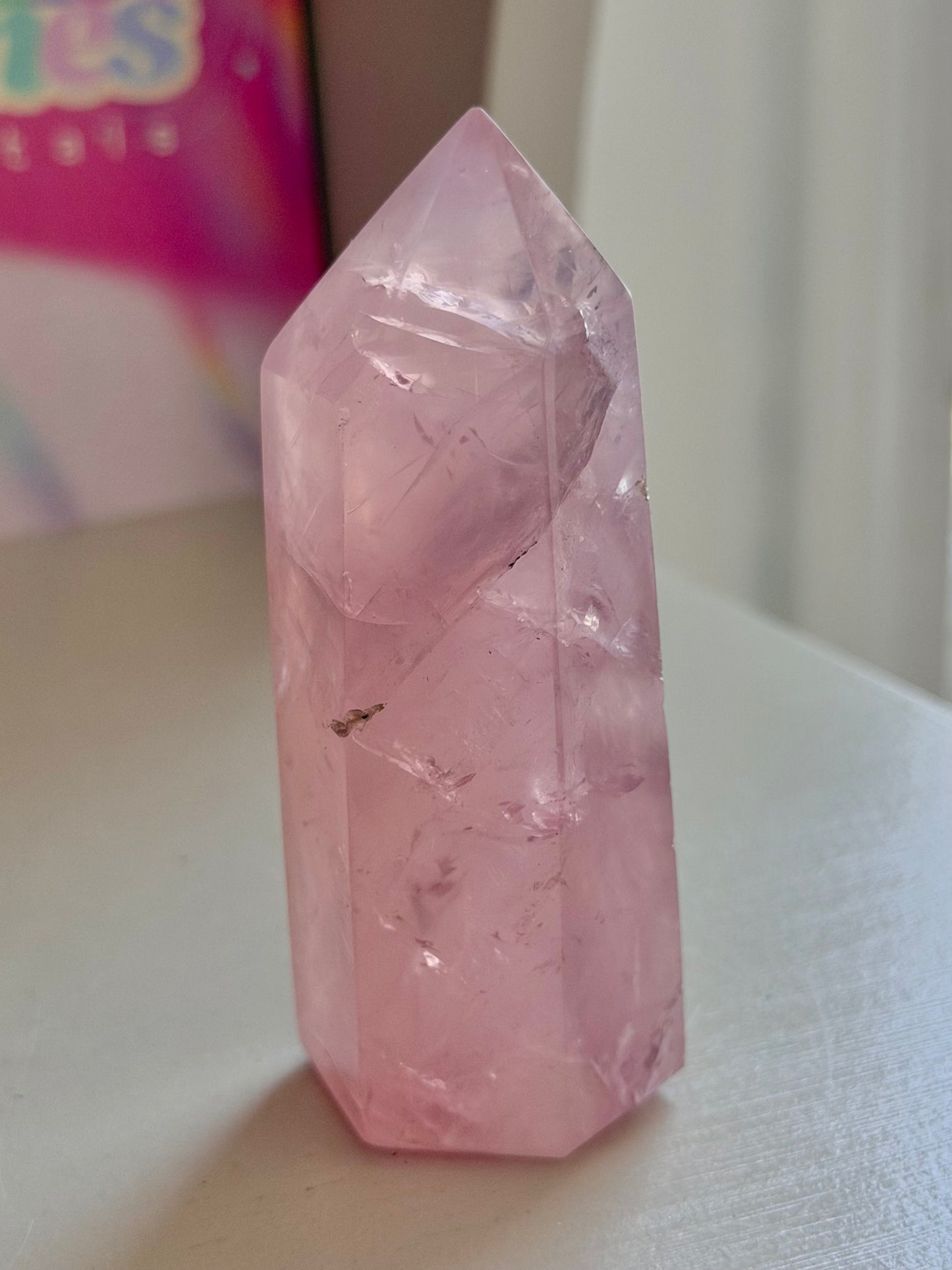 Gemmy purple-toned rose quartz tower