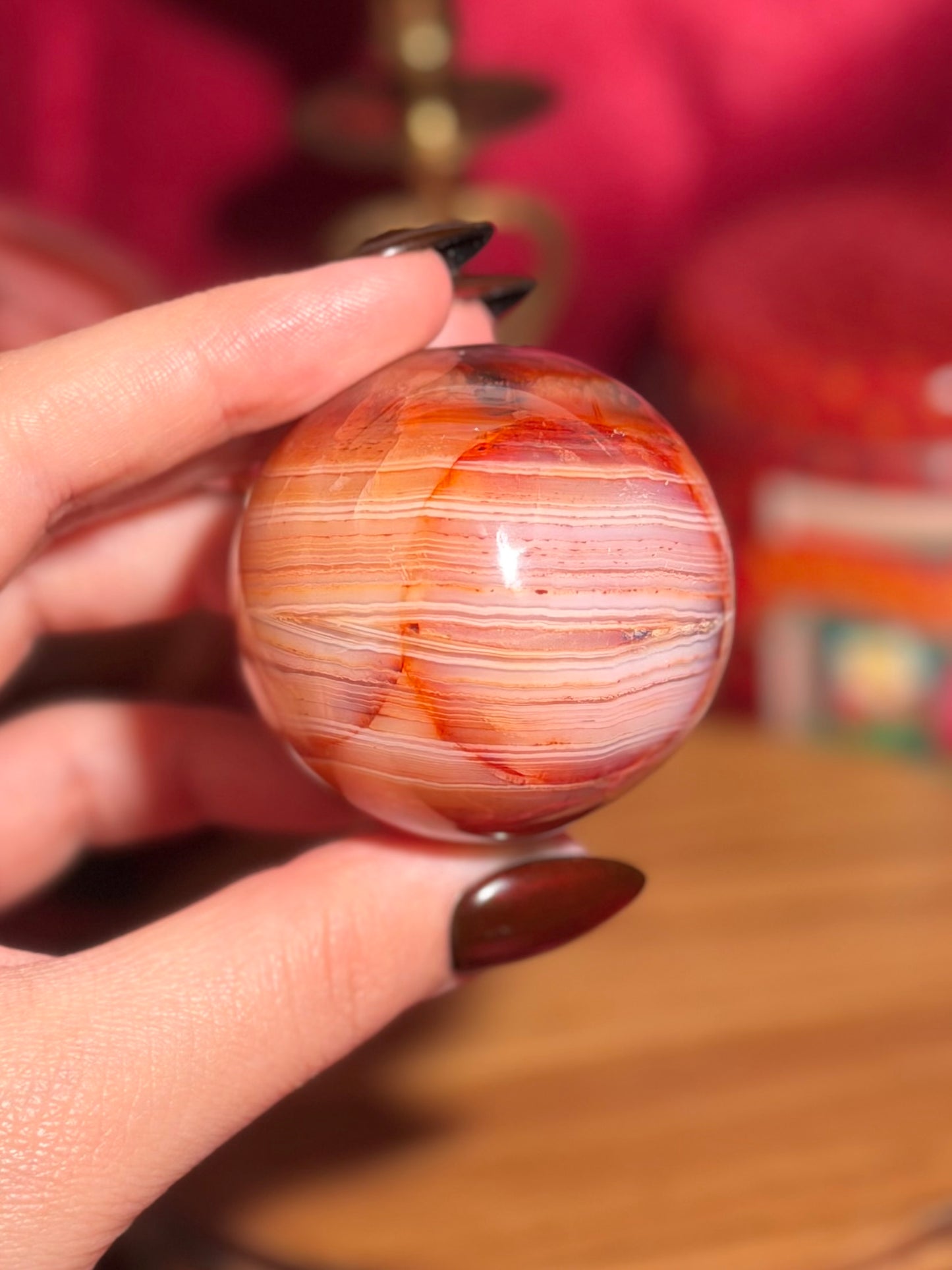 Pink banded carnelian sphere