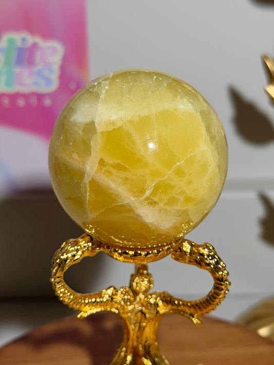 Lemon calcite sphere from Pakistan with rainbows (24A)