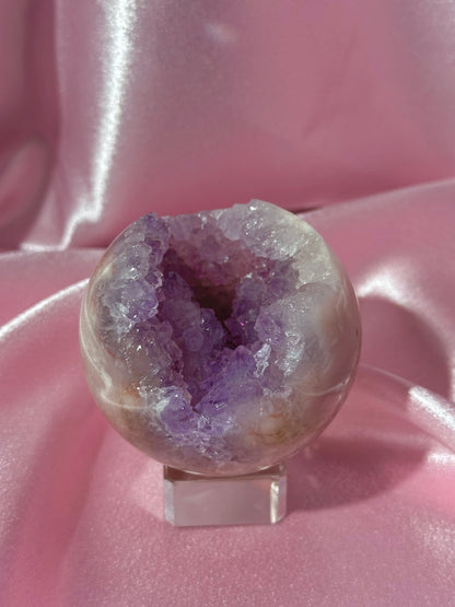 Brazilian pink amethyst sphere with purple druzy cave