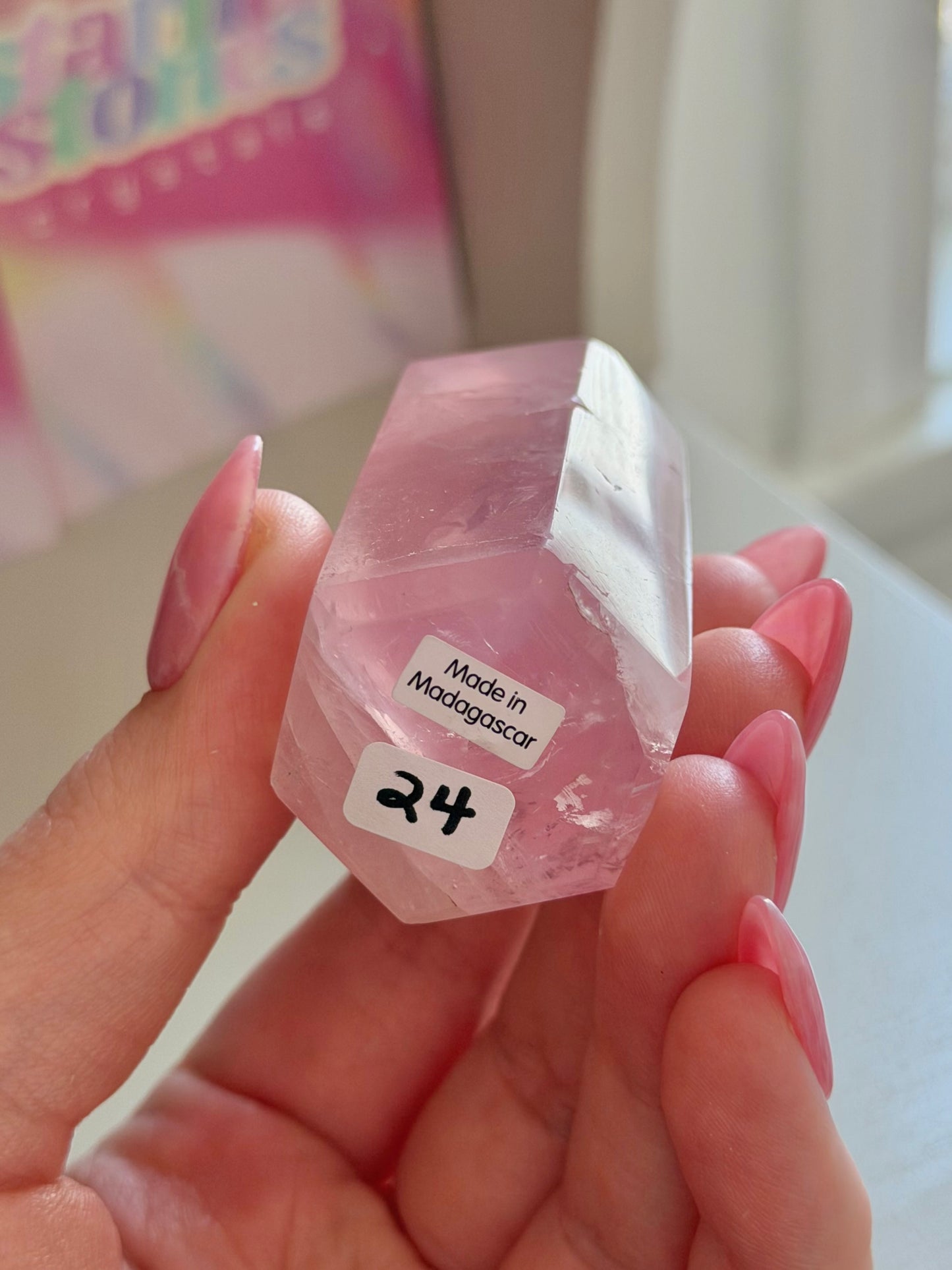 Gemmy purple-toned rose quartz tower