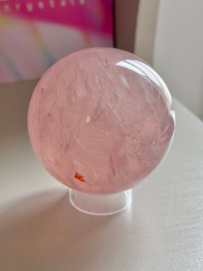 Pink gemmy star rose quartz sphere