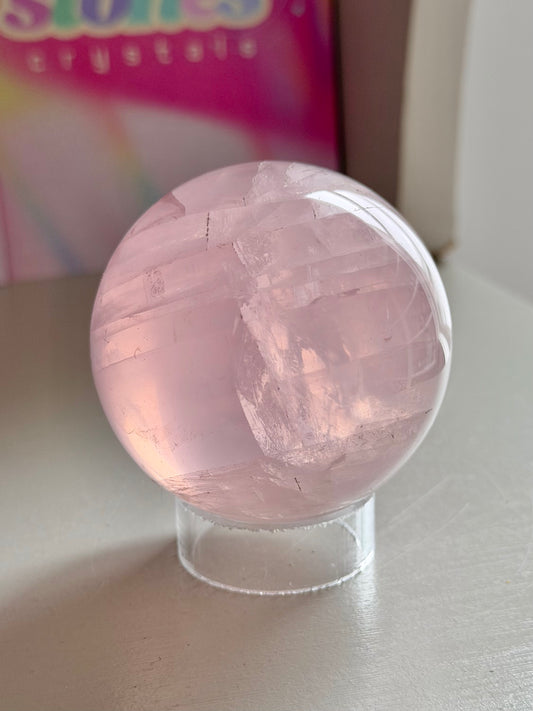 Pale pink gemmy star rose quartz sphere