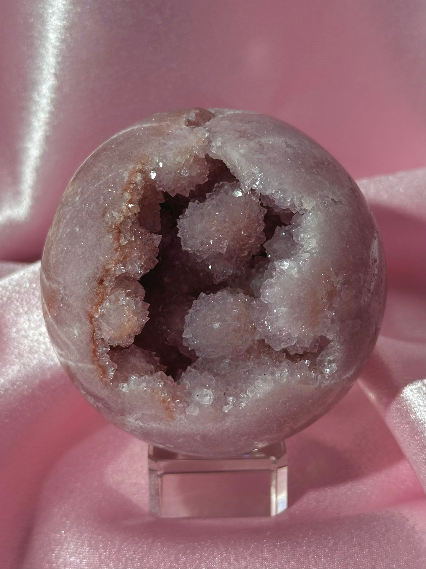 Brazilian pink amethyst x flower agate sphere with bubbly druzy cave