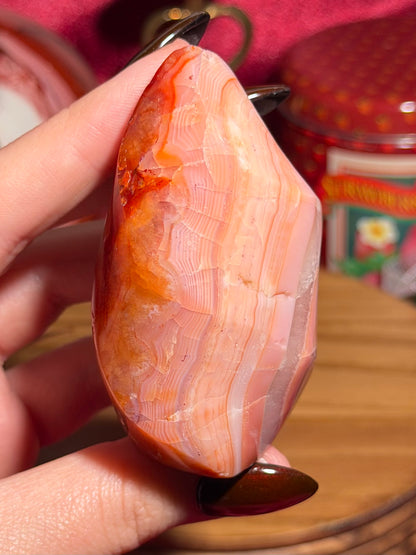 Pastel pink carnelian flame with quartz