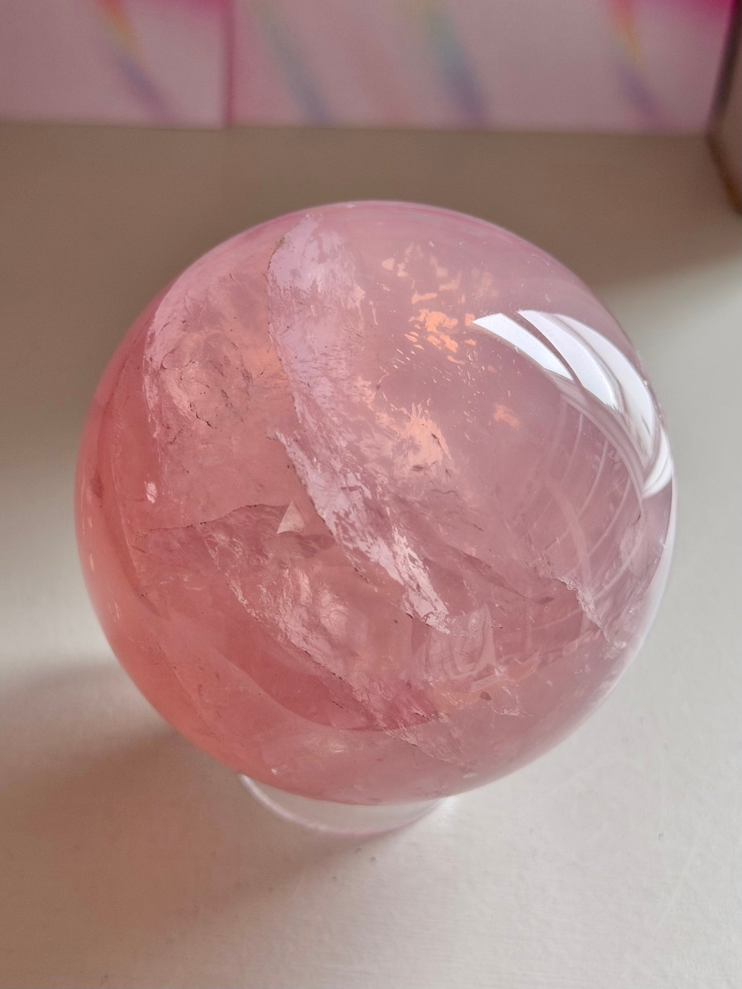 Gemmy purple-pink toned star rose quartz sphere