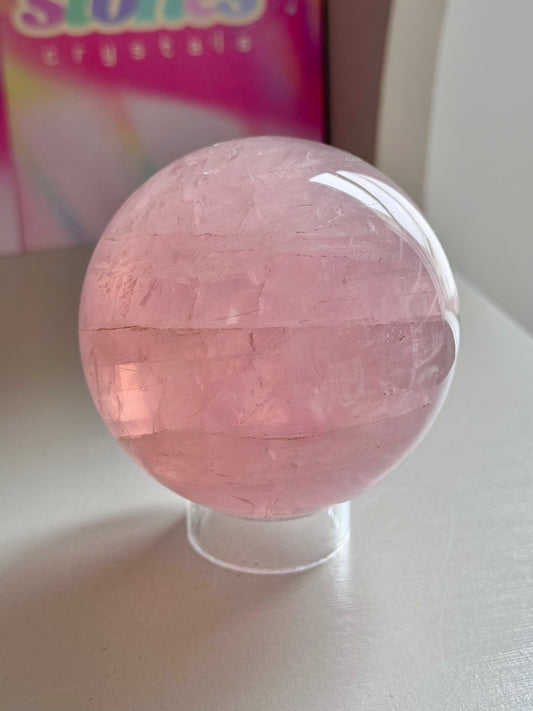 Pink gemmy star rose quartz sphere