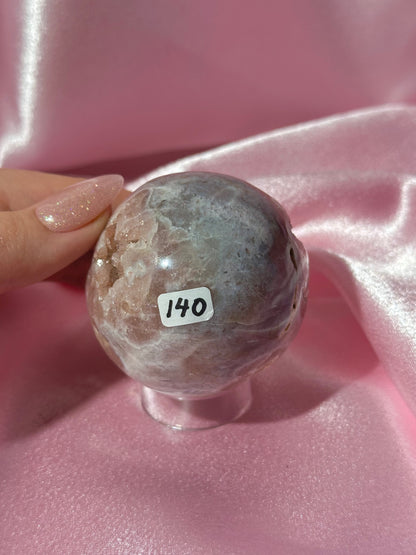 Brazilian pink amethyst sphere with unique bubbly druzy cave