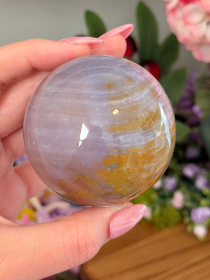 Glowy purple sea jasper sphere