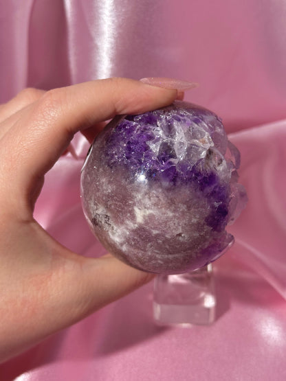 Grape jelly purple Brazilian pink amethyst sphere with unique quartz caves