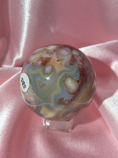 Perfect pastel peachy yellow & blue flower agate sphere from Madagascar