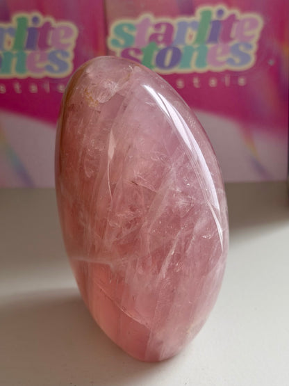 Glassy “guava” pink rose quartz freeform