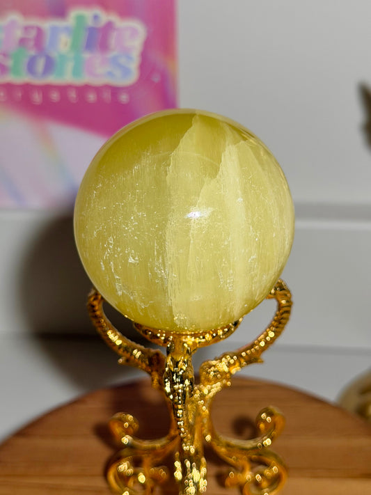 Lemon calcite sphere from Pakistan with rainbows