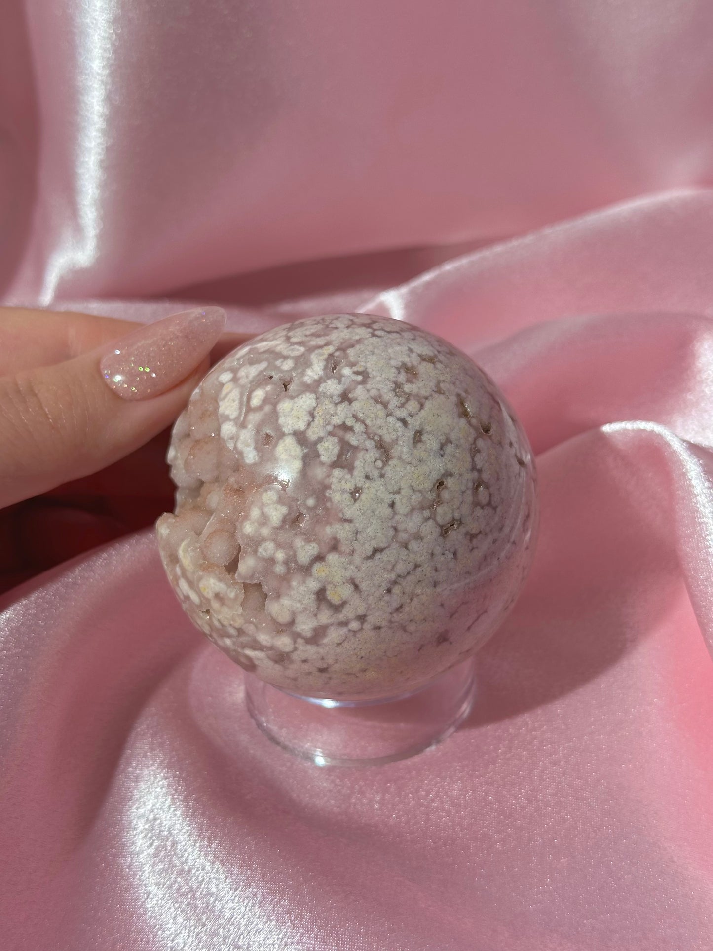 Pink pastel flower agate sphere from Madagascar with bubby druzy