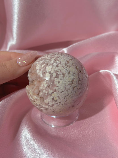Pink pastel flower agate sphere from Madagascar with bubby druzy