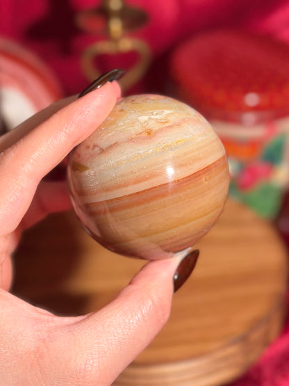 Warm toned polychrome jasper sphere