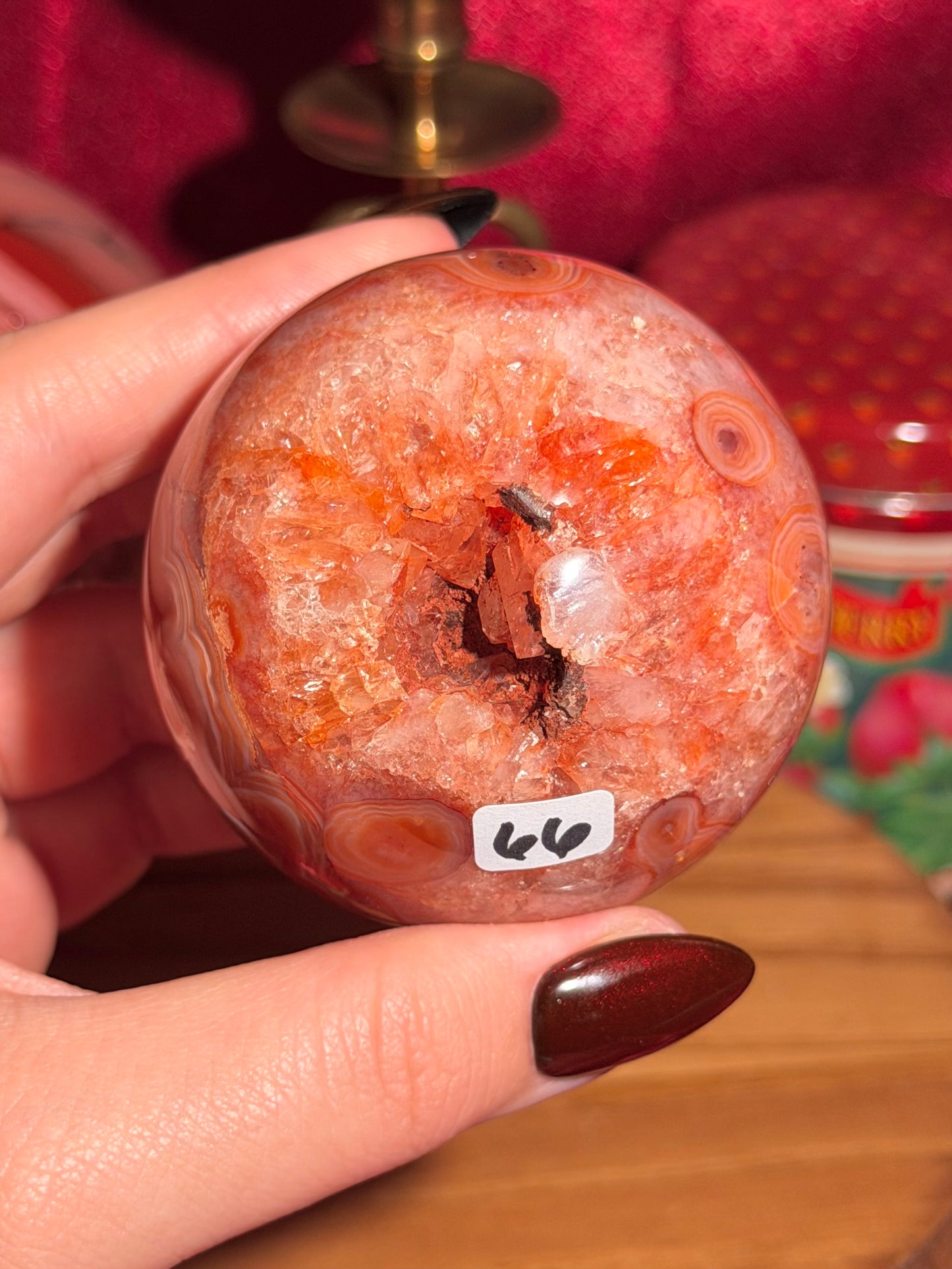 Mossy carnelian sphere with quartz cave