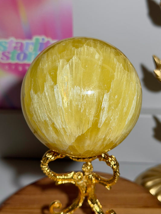 Lemon calcite sphere from Pakistan with rainbows