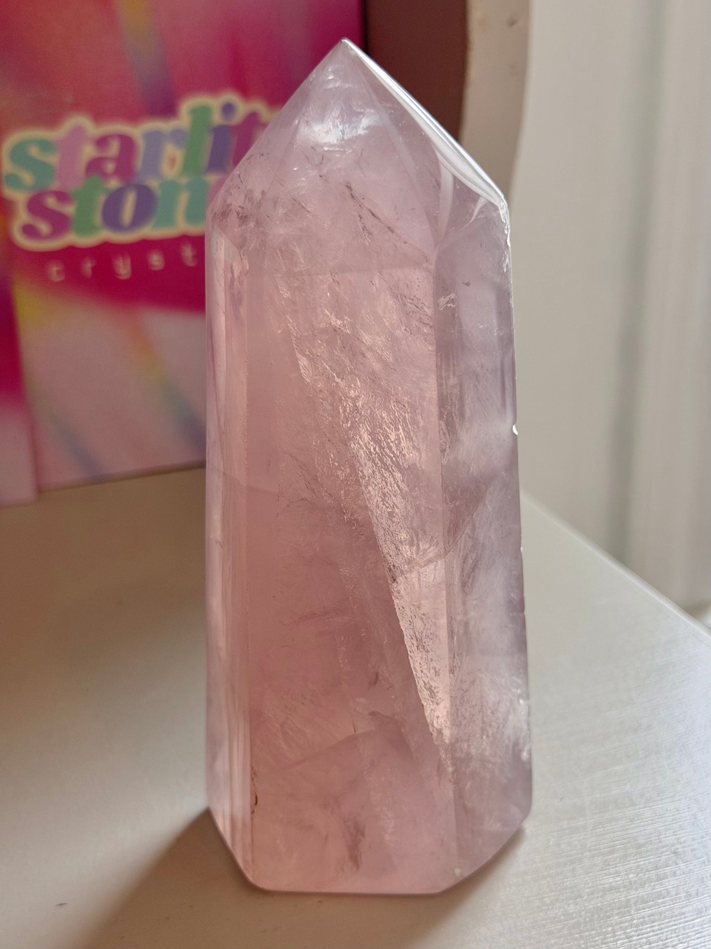 Glassy pink rose quartz tower