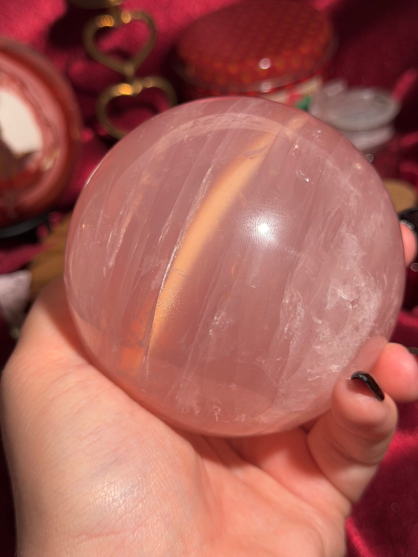 High quality star rose quartz sphere with golden glittery flash