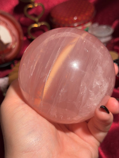 High quality star rose quartz sphere with golden glittery flash