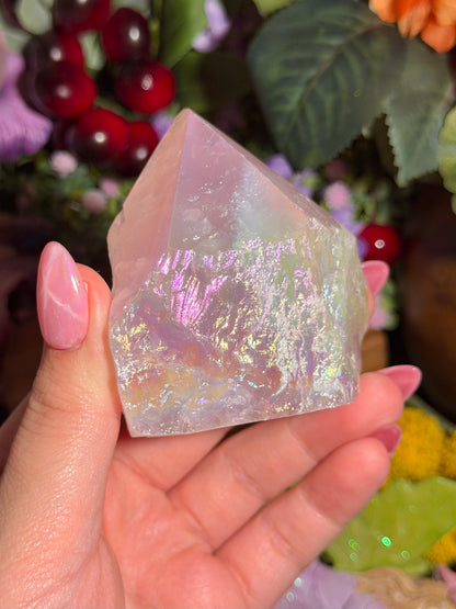 Aura coated rose quartz half polished point from Brazil