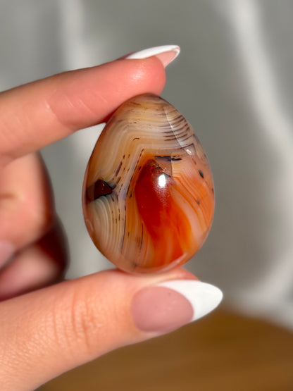 Speckled “koi fish” carnelian egg