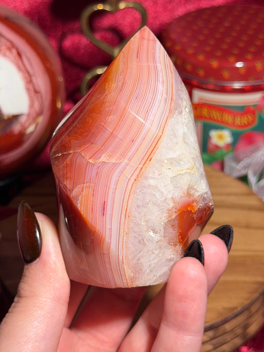Pink banded carnelian flame with quartz