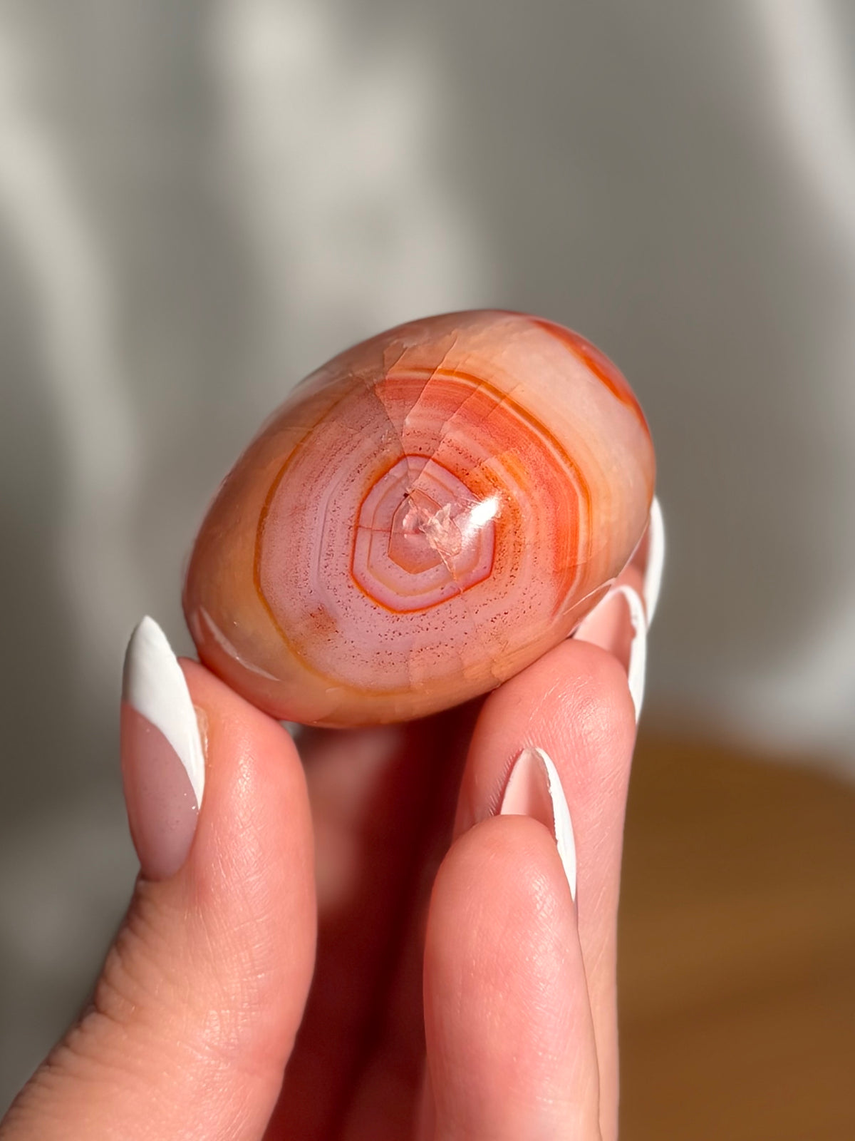 Pink banded carnelian palmstone