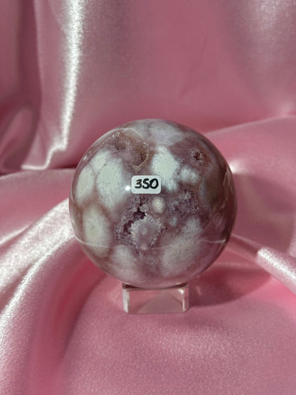 Brazilian pink amethyst x flower agate sphere with druzy cave