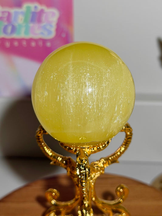 Lemon calcite sphere from Pakistan with rainbows