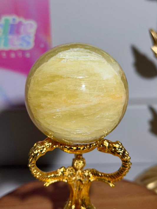 Lemon calcite sphere from Pakistan with rainbows (24A)