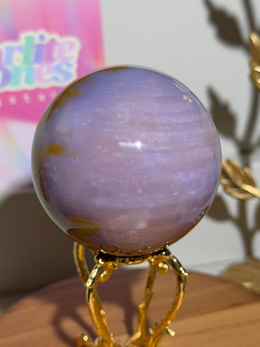 Glowy purple sea jasper sphere