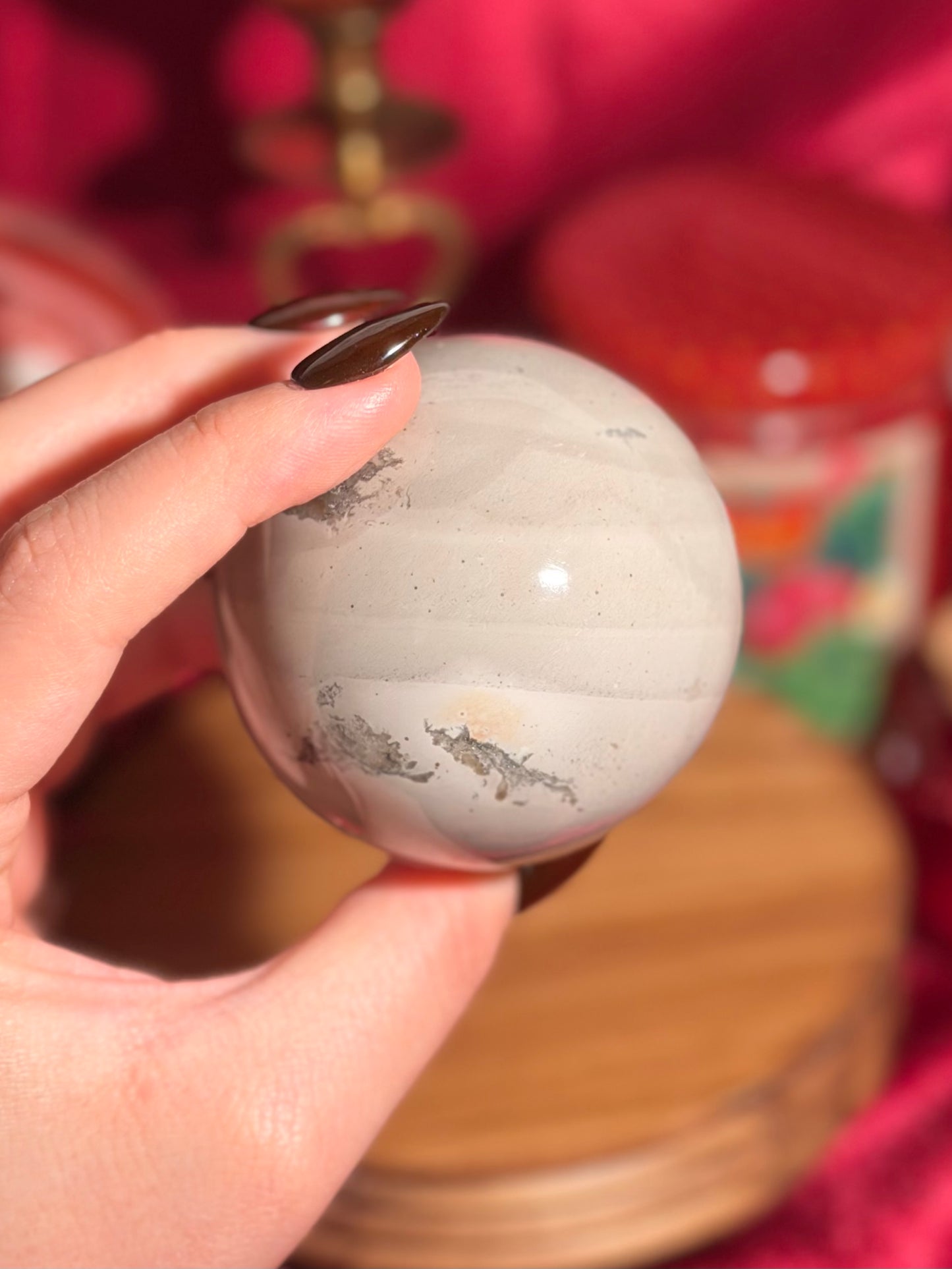 Cool grey polychrome jasper sphere with a pop of pink