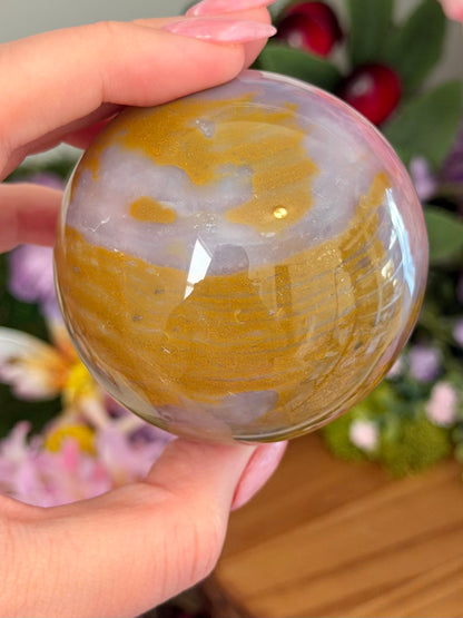 Glowy purple sea jasper sphere