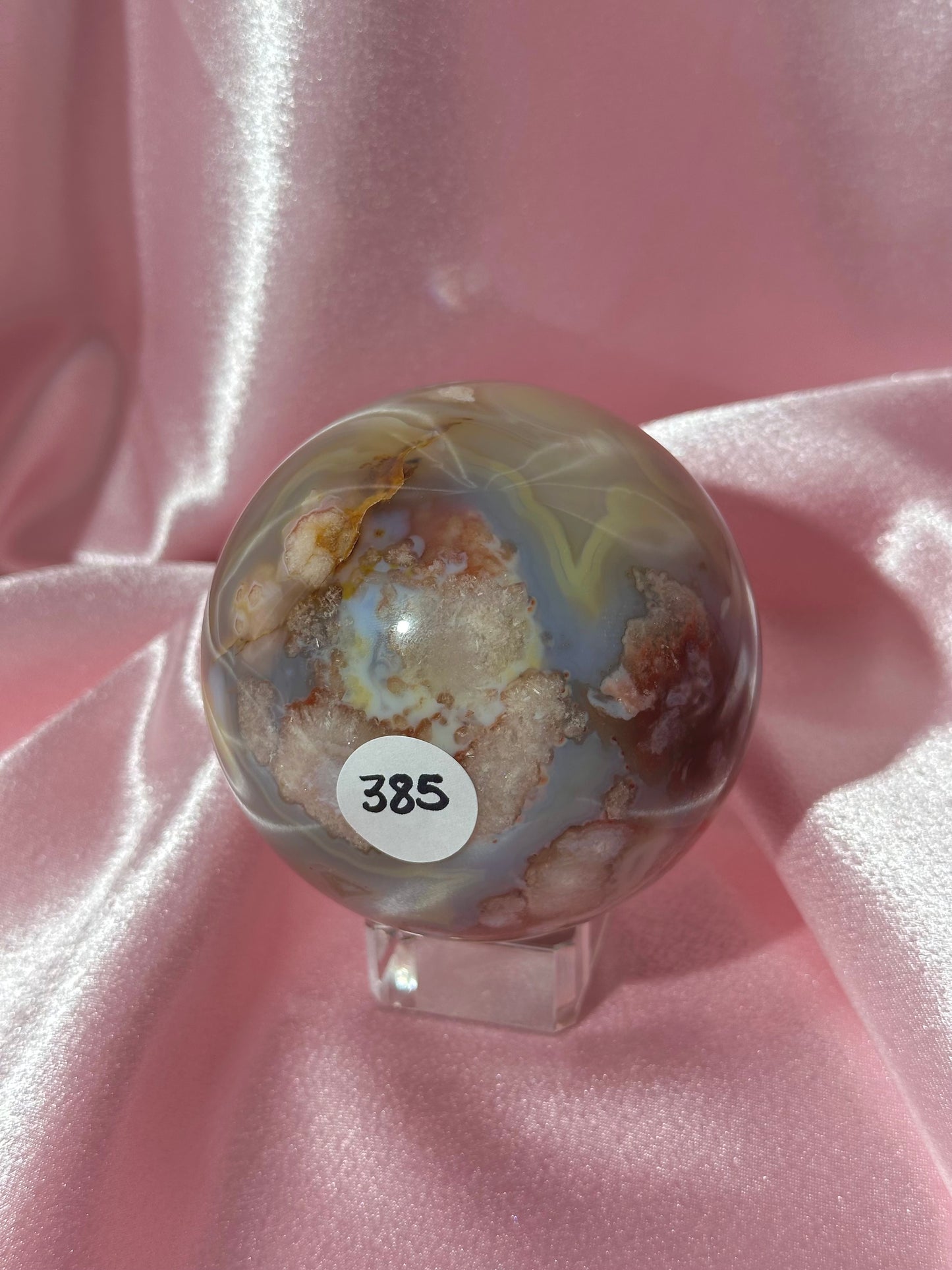 Perfect pastel peachy yellow & blue flower agate sphere from Madagascar