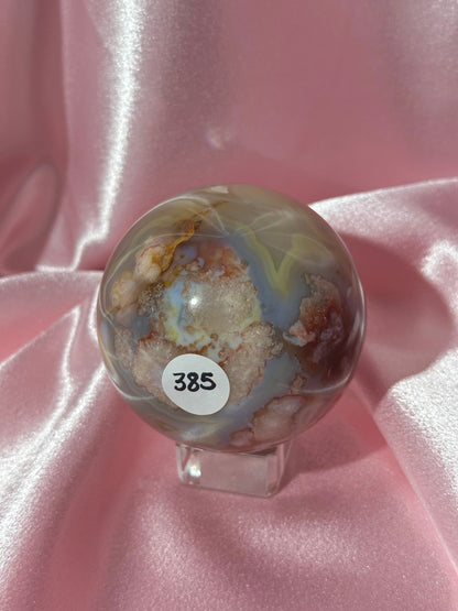 Perfect pastel peachy yellow & blue flower agate sphere from Madagascar