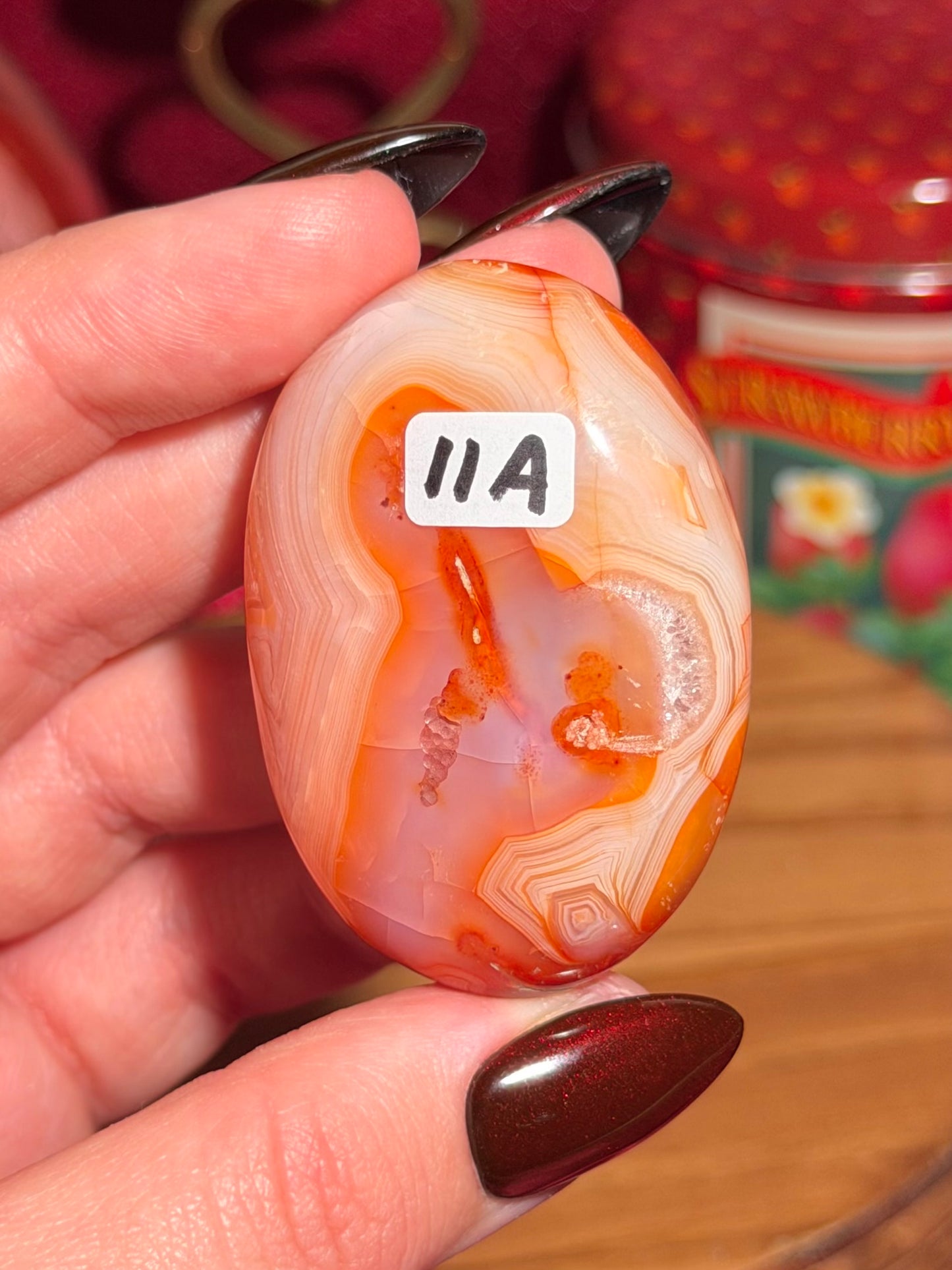 Creamsicle funky banded carnelian palmstone 11A